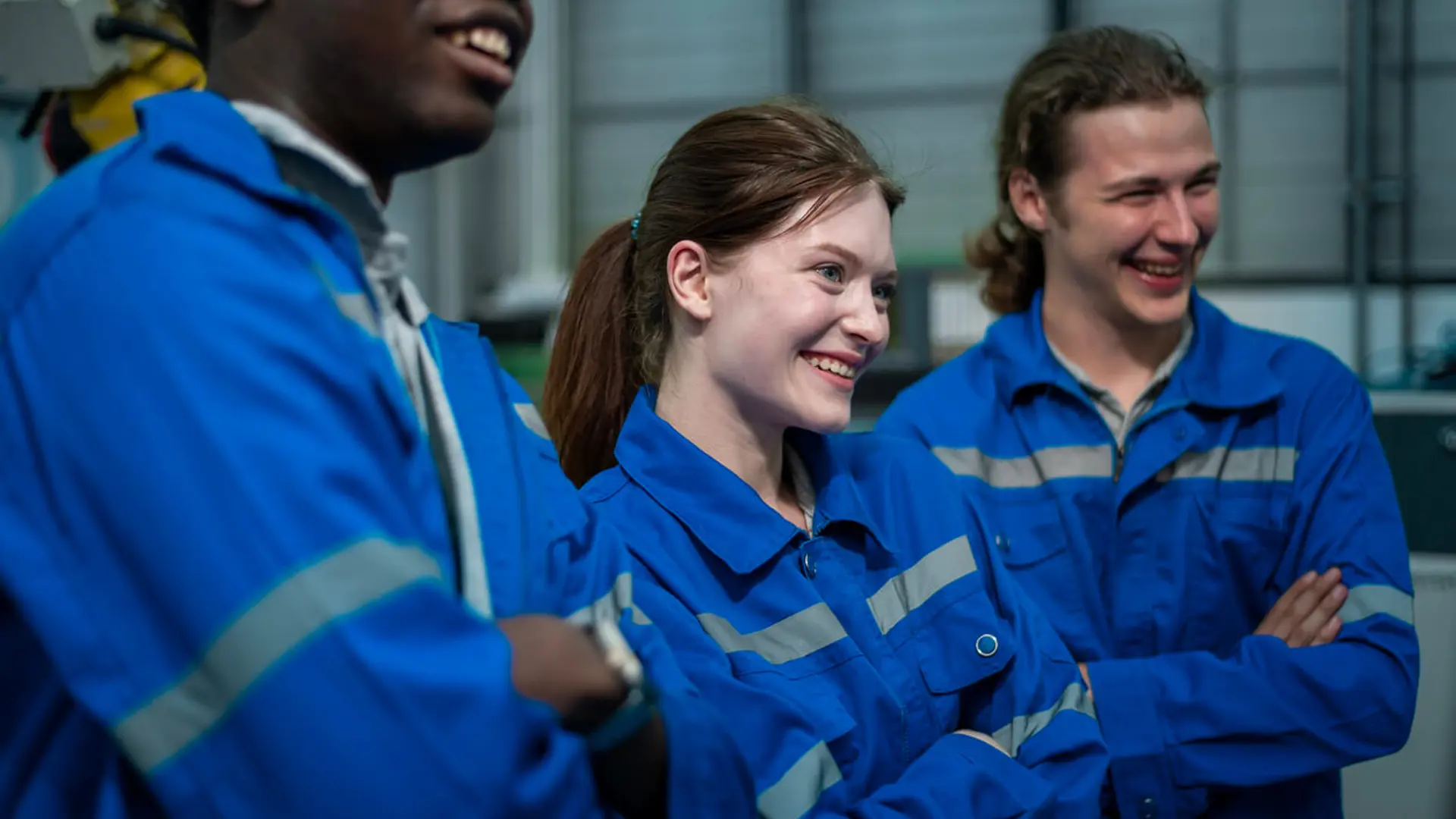 Tre lærlinge i kedeldragter