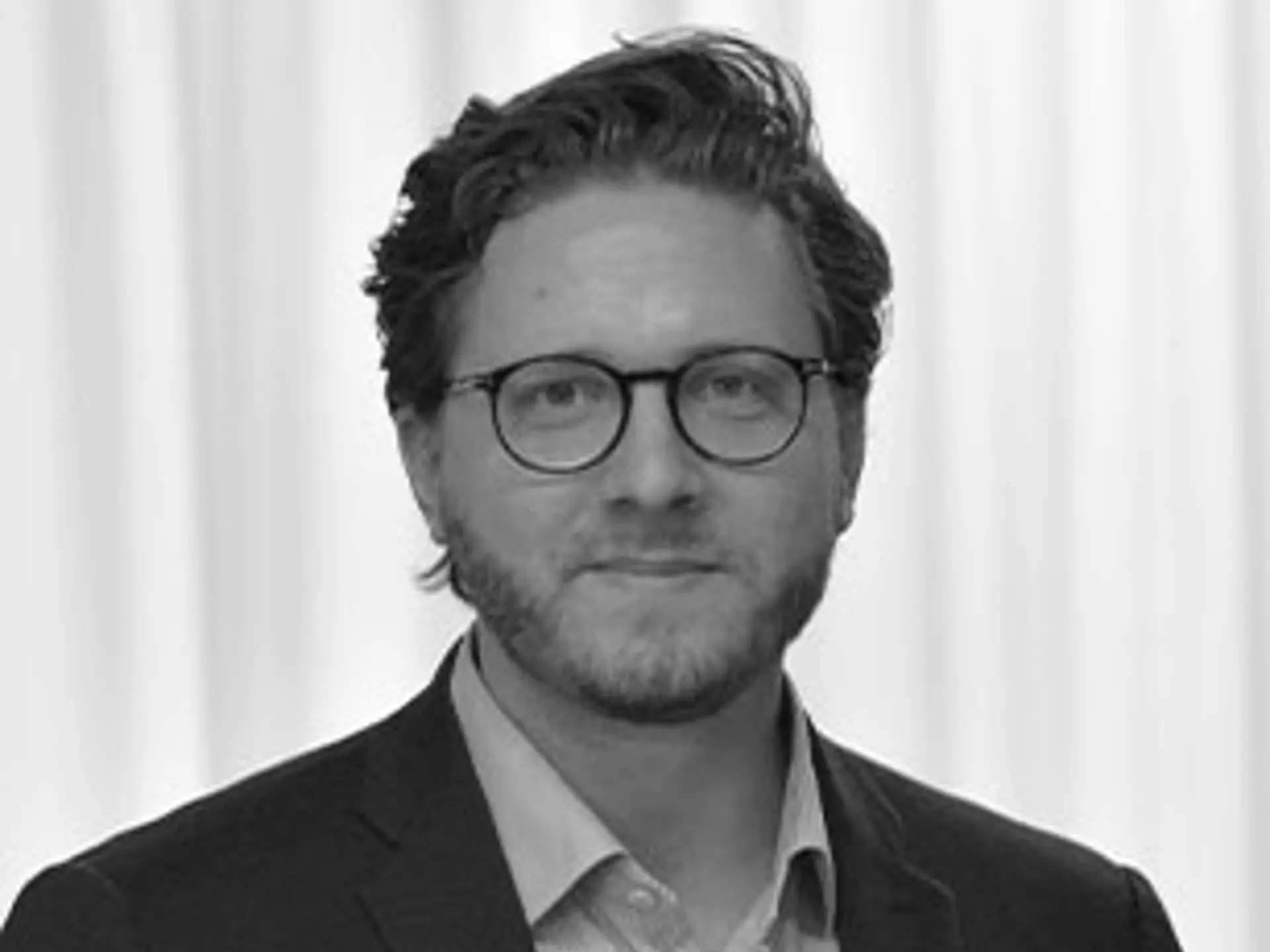 Portrætfoto af bestyrelsesmedlem Mikkel Lundemann Rasmussen